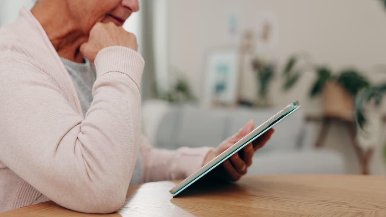 Hands, tablet and a senior woman in her home