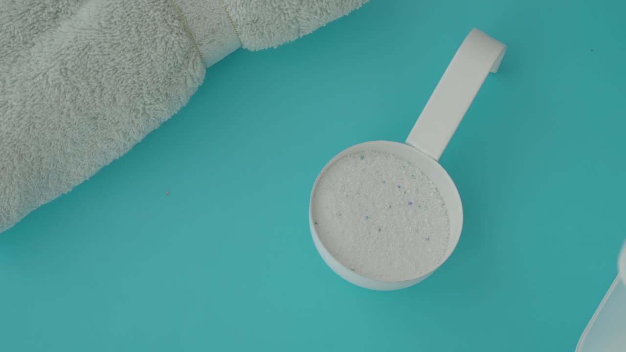 Laundry Detergent in Measuring Cup