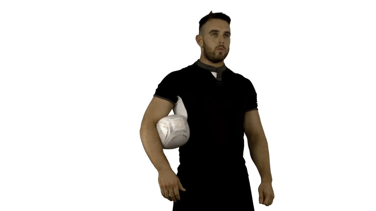 jugador de rugby serio con la pelota