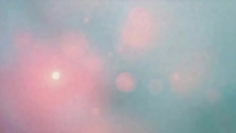 abstract bokeh light background with pink and blue tones