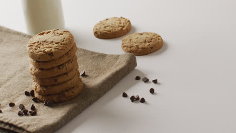 Video-of-biscuits-with-chocolate-and-milk-on-white-background