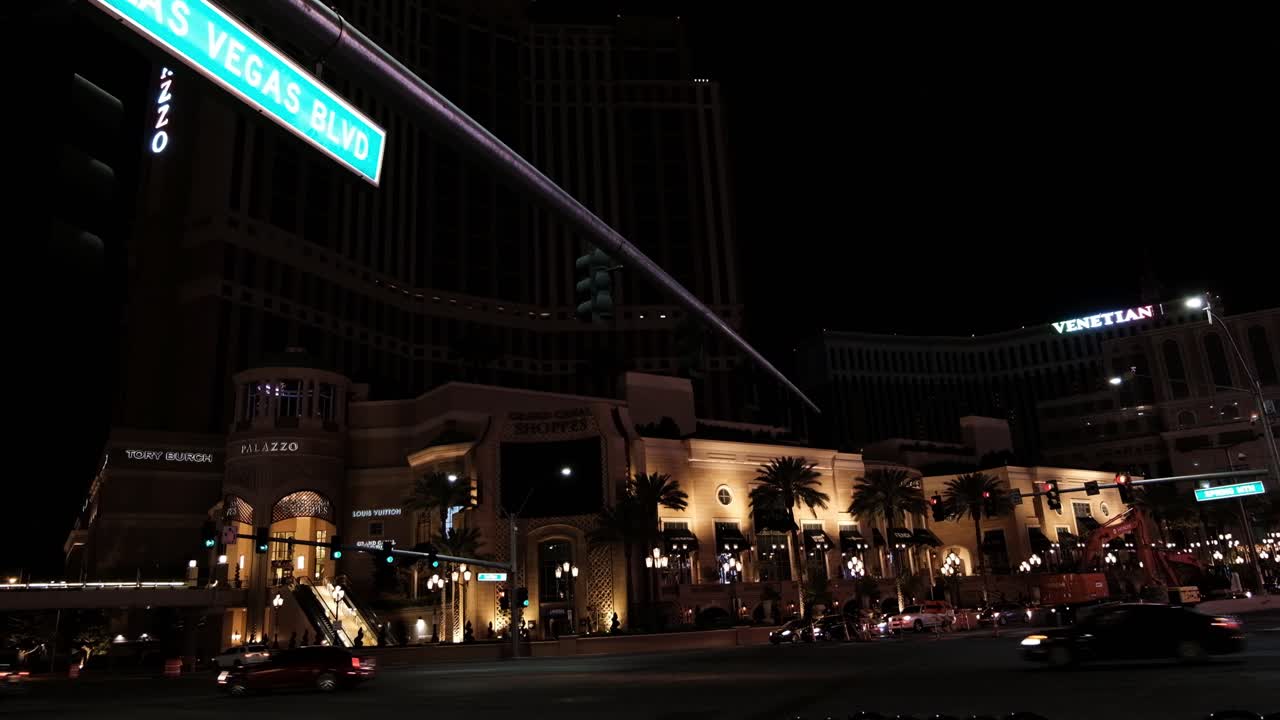 Spooky Las Vegas USA During Coronavirus Outbreak and Lockdown. Night Traffic on Strip by Palazzo Tower and Venetian Hotel - Casino
