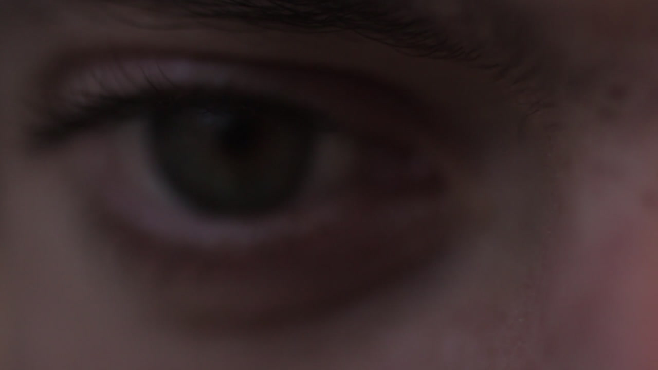 Extreme close-up of a human eye showing deep emotion and presence