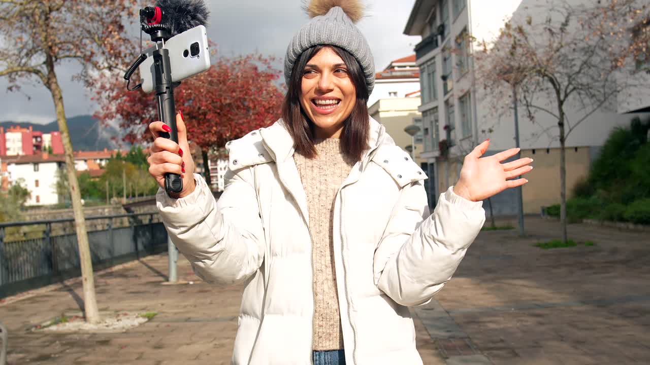 Woman Vlogging Outdoors in Winter