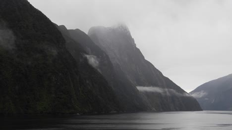 otherworldly landscape of milford sound (piopiotahi), fiordland national park on the south island of new zealand.
