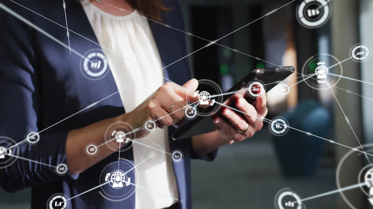 Animation of network of connections with icons over caucasian casual businesswoman using tablet