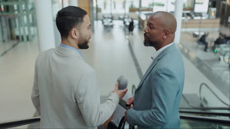 Escalator,-handshake-and-business-men