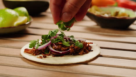 making a carnitas taco