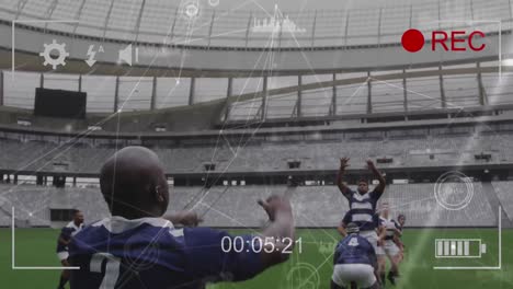 animation of data processing over network of connections over rugby match in sports stadium