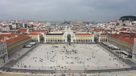 a city square soaring over lisbon