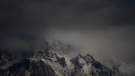 timelapse of foggy peaks mountain cerro paine grande, patagonia, chile