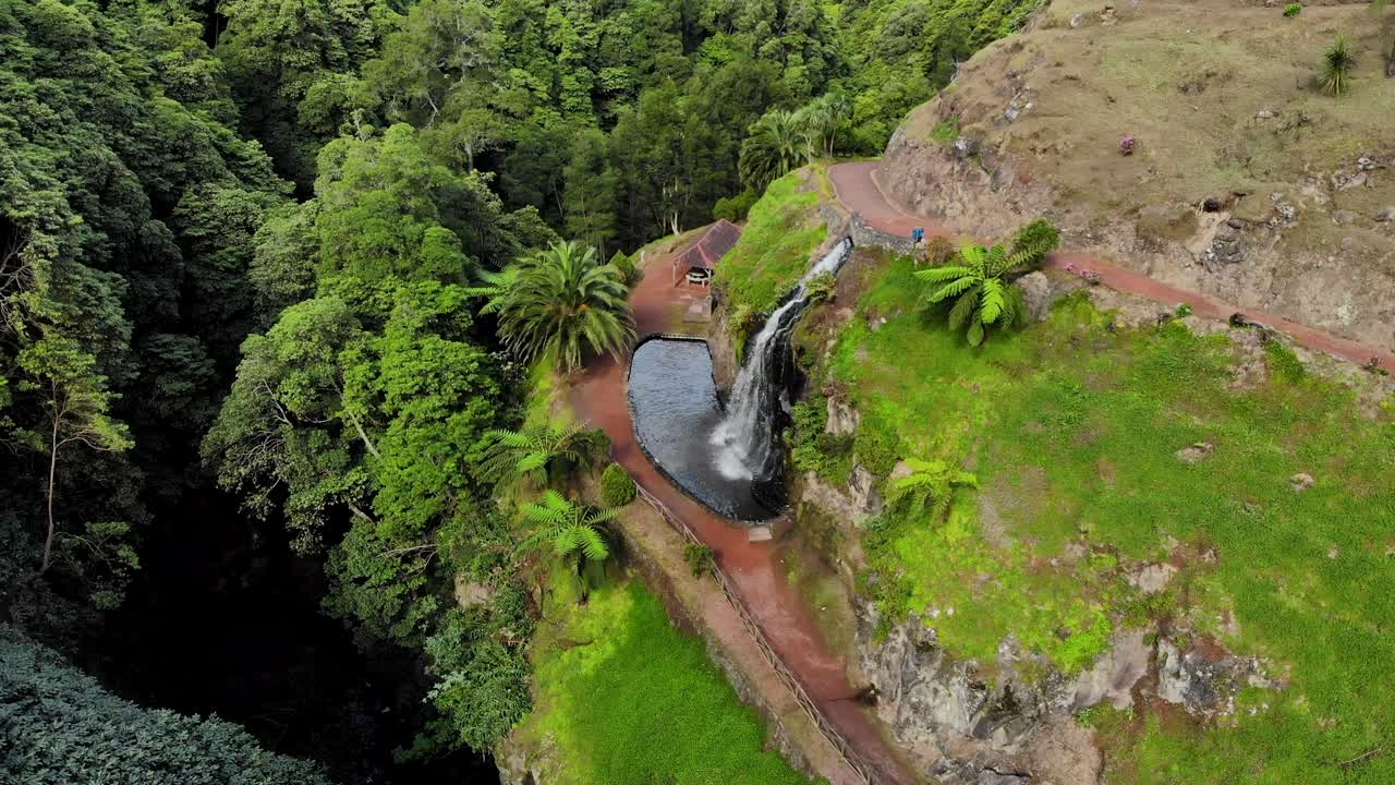 4K aerial footage of the Ribeira dos Caldeirões Natural Park and one of its Waterfalls in São Miguel Island, Azores, Portugal
