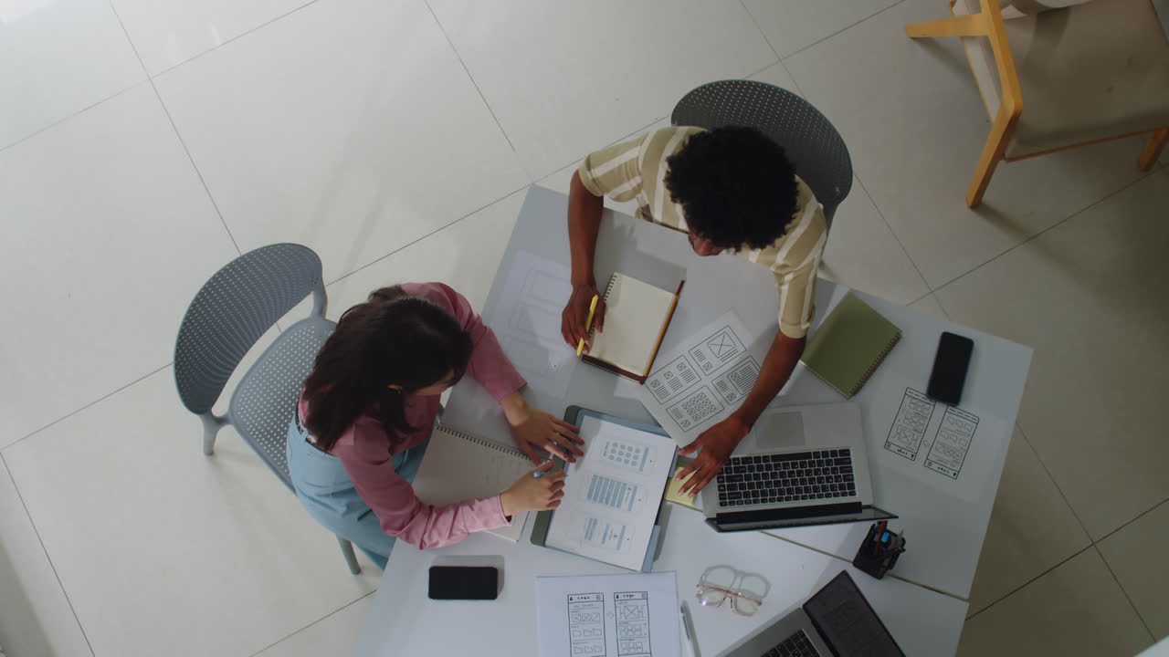 IT Specialists Developing Mobile Application Top Down