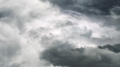 a thunderstorm in a dark cloud with lightning striking