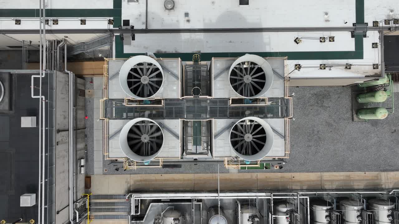 Rotating propeller of Air Conditioner on roof of Factory Building