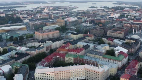 aerial pan of helsinki finland colorful buildings city from above