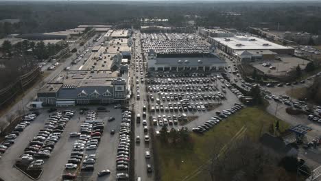 aerial time lapse showing heavy traffic outside shopping plaza in south hingham, massachusetts during festive season