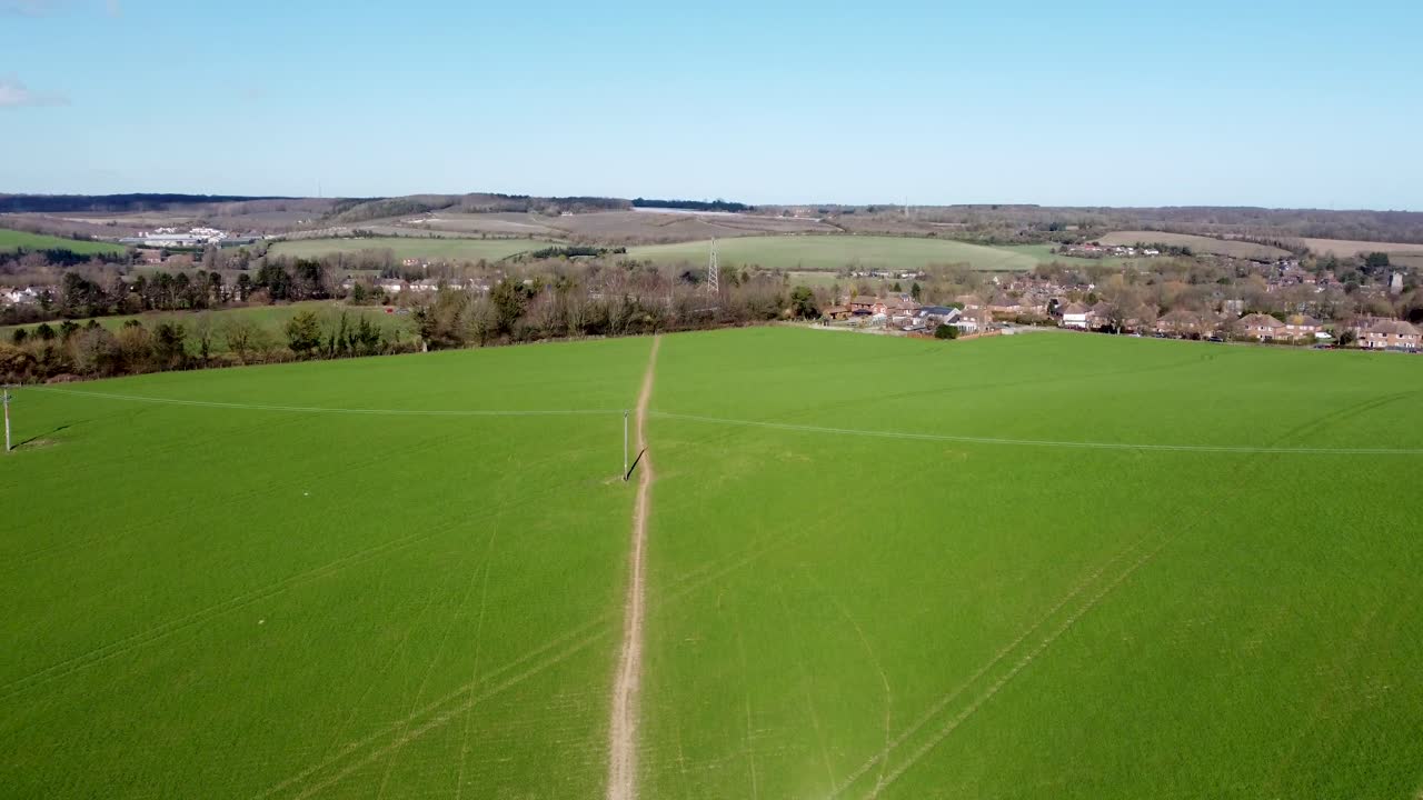 Green field with footpath running through it