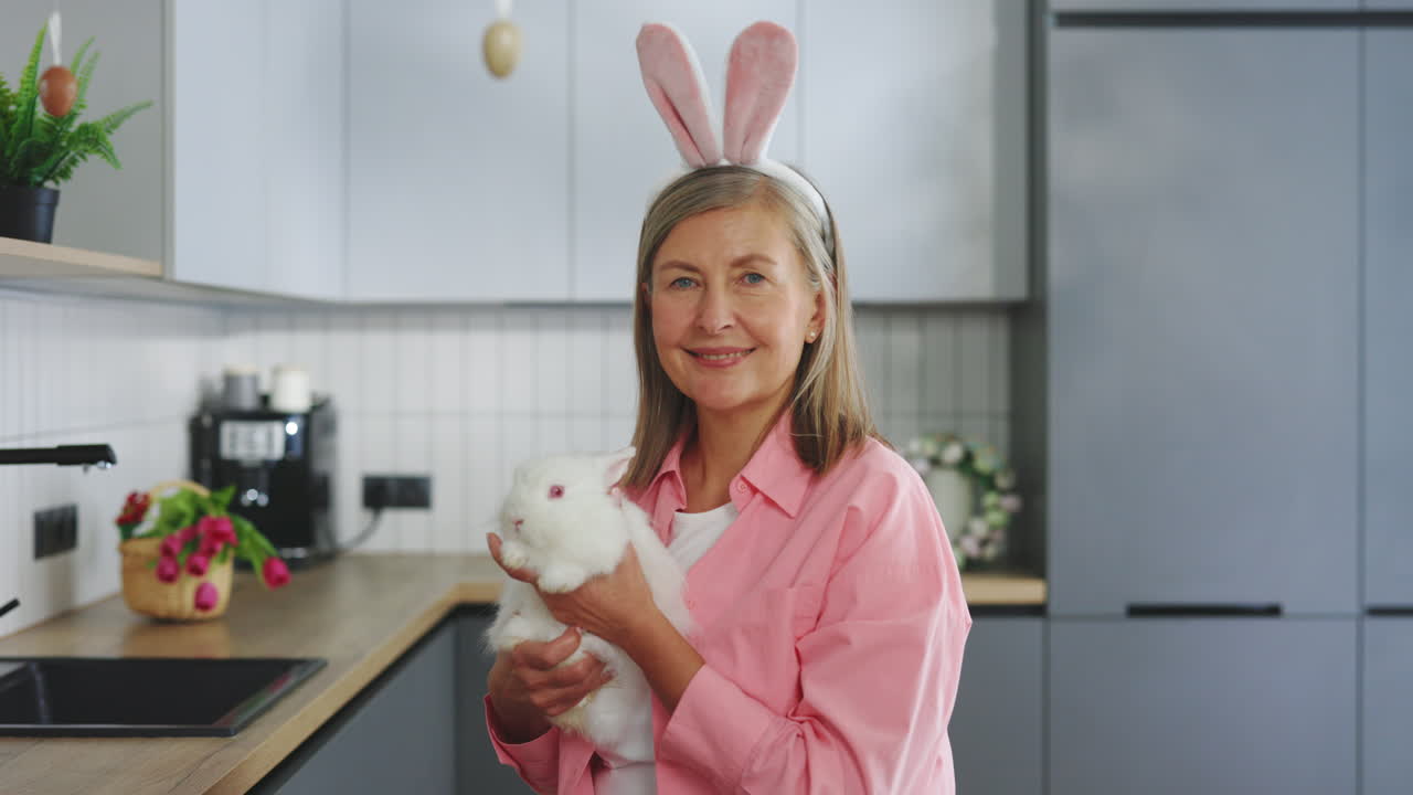 Woman with Easter Bunny in Kitchen