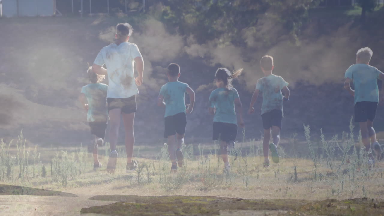 Running outdoors, group of children with adult in sunny, grassy area, animation