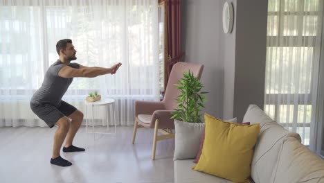 Young-man-exercising-at-home.