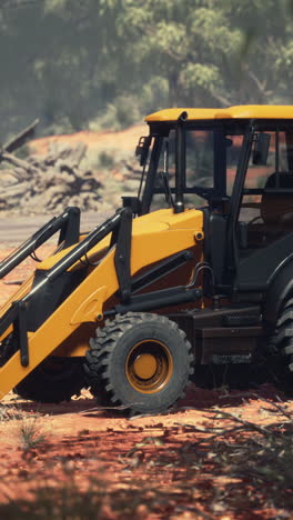 yellow excavator in a construction site