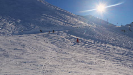 ski-area-in-the-Swiss-alps-with-people-and-chairlifts-in-the-winter-ski-area-of-Beckenried