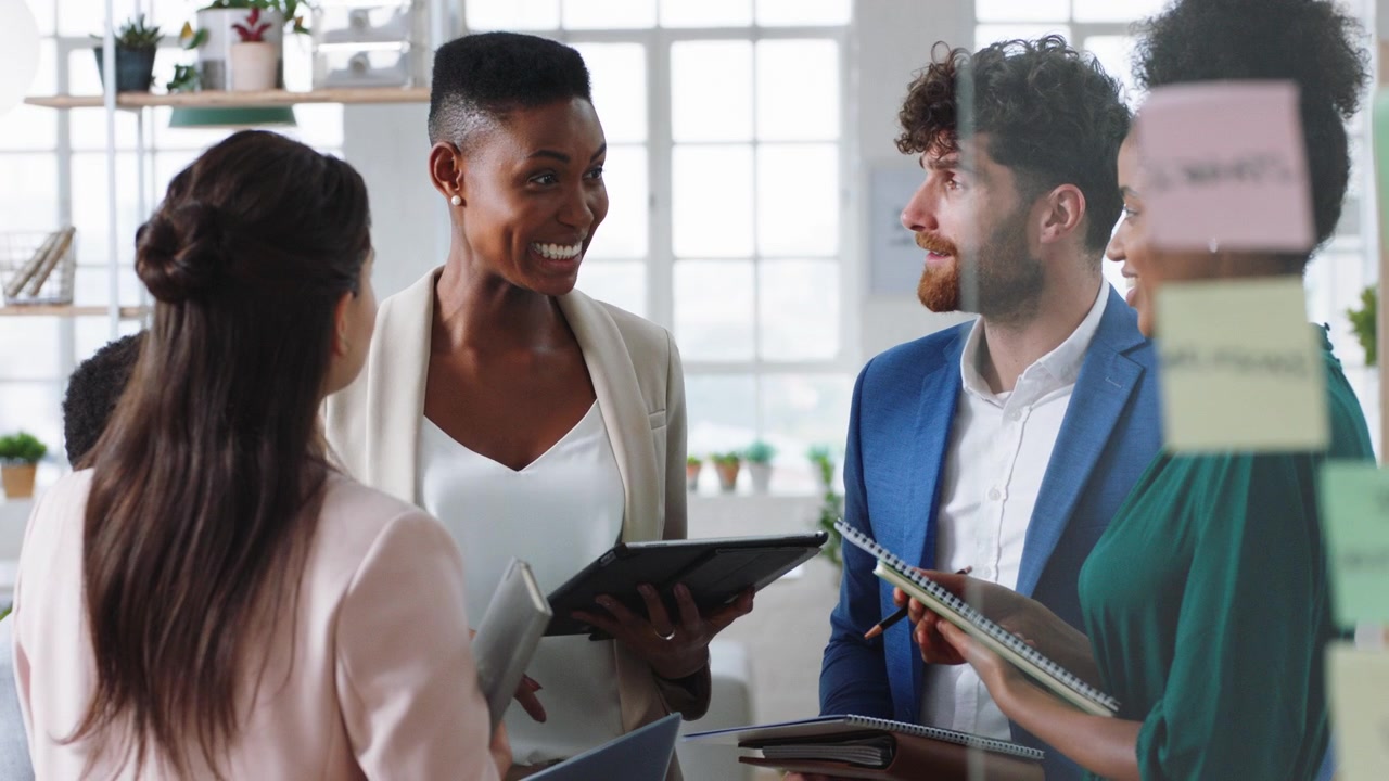 Diverse Business Team Collaborating in Modern Office Meeting
