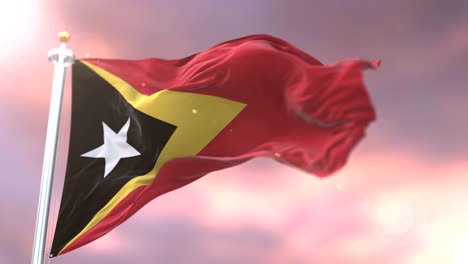 flag of east timor waving at wind at sunset in slow, loop