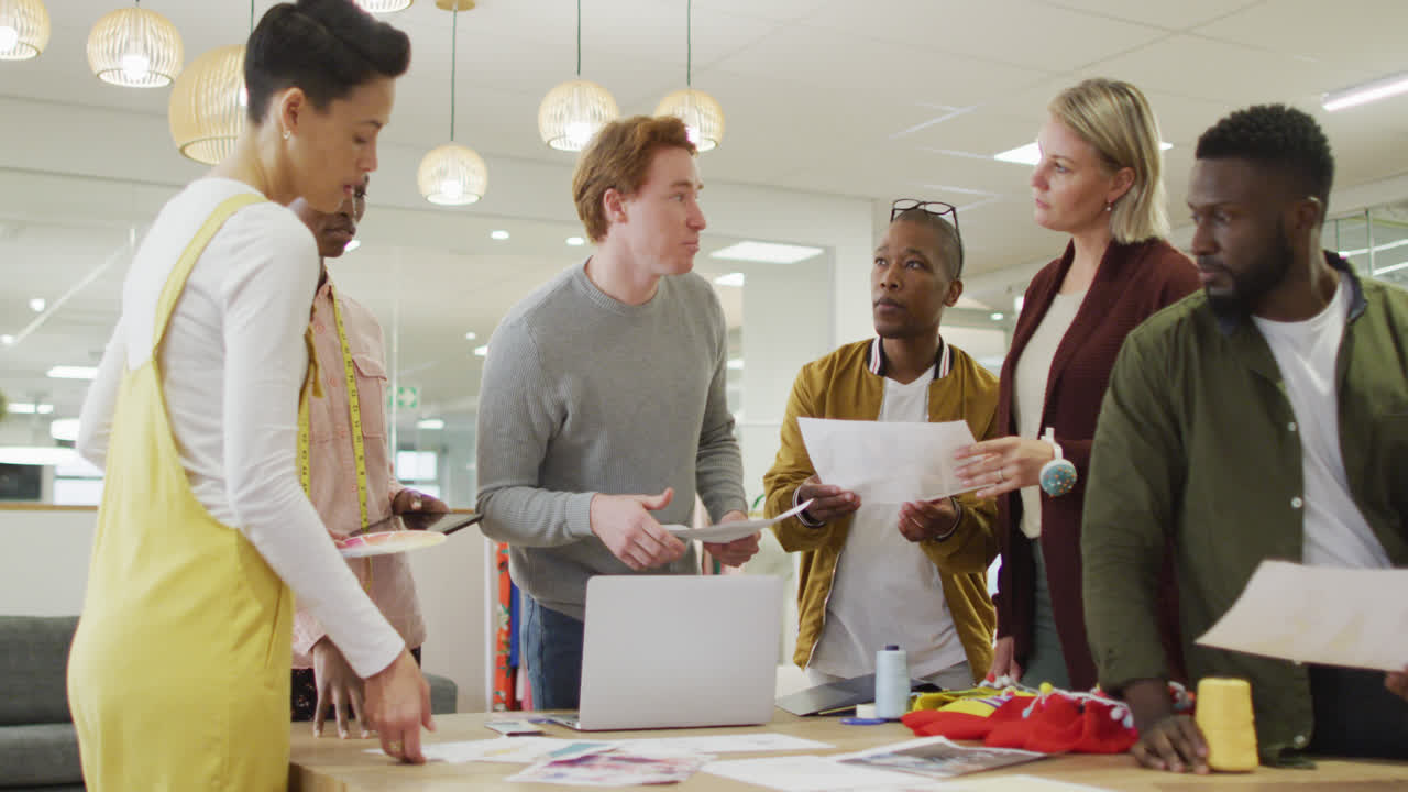 Diverse group of male and female business colleagues working in office