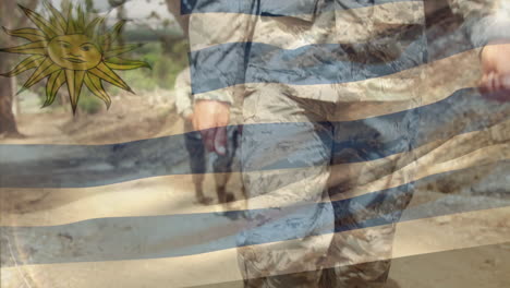 animación de la bandera de uruguay sobre varios soldados