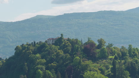 Aerial-tracking-shot-of-luxury-house-on-a-mountain,-Verbania-near-Lago-Maggiore