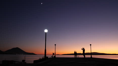 Epic-shot-of-a-purple-sunset-view-from-a-pier