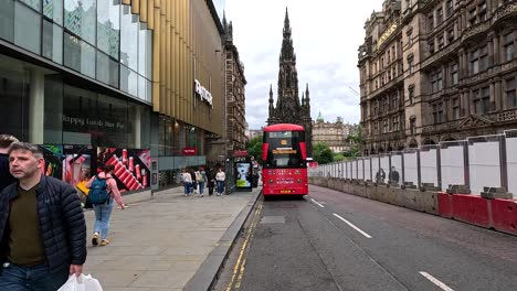 people walking near a bus in edinburgh