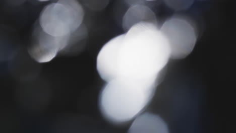 video de puntos de luz bokeh blancos parpadeantes con espacio de copia