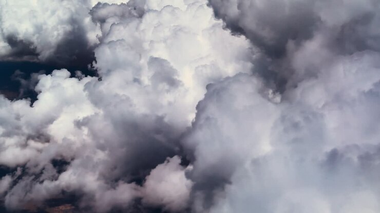 Epic view of clouds from above, high altitude cloud formation overview