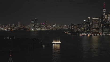 nyc new york aerial v292 flyover brooklyn waterfront district capturing illuminated ventilation building, jersey city and lower manhattan night cityscape - shot with inspire 3 8k - september 2023