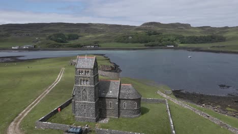 4k-aerial-drone-footage-surrounding-historic-st-edwards-church-on-sanday-island-near-isle-of-canna-scotland-uk