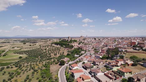 Wide-panoramic-view-of-typical-Spanish-village,-aerial-orbit