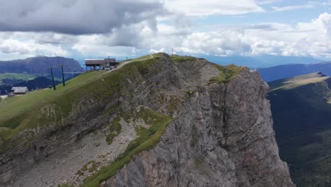 Drone-approach-shot-toward-Seggiovia-Fermeda-on-Seceda-Ridgeline,-Italy