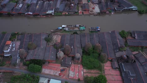 aerial view of brick kilns and canal in vinh long in the mekong delta, vietnam