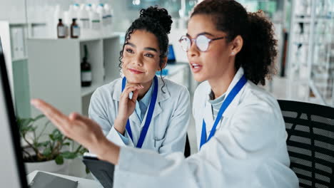 two female scientists working in a lab