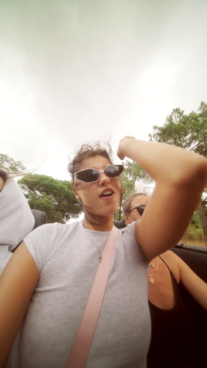 Women on a road trip in a convertible