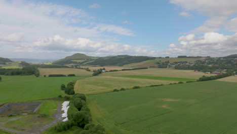 Rural-farmland-in-Norway-with-grain-production,-aerial