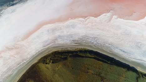 aerial view of pink and white salt flats