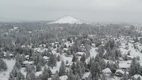 fresh snowfall over bend oregon and pilot butte neighborhood | 4k