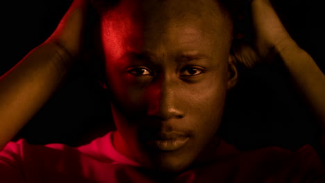 portrait of a man in red light