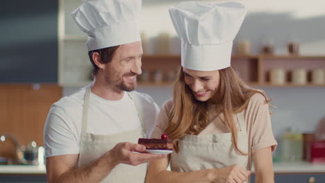 man and woman baking together at home