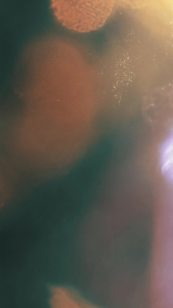 Abstract Light Leaks and Film Grain Texture Overlay