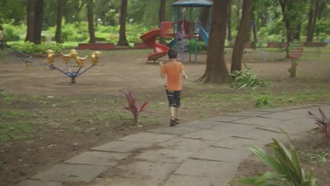 thrill-seeking boy explores goa's vibrant amusement park, embracing exciting rides and vibrant colors, immersed in a world of joy and adventure